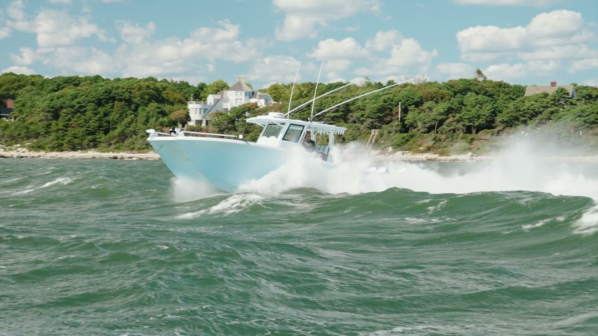 A Moore Yacht Sales center console running off the Massachusetts coast